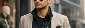 Homme d’une trentaine d’années portant une tenue moderne et élégante, illustrant l’équilibre entre nouveauté et crédibilité en mode masculine