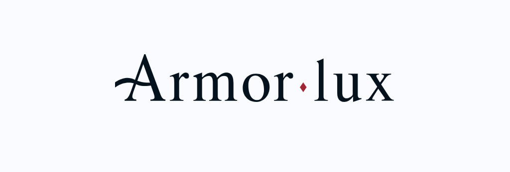 Logo Armor Lux, marque française de vêtements et marinières Made in France Logo officiel de la marque Armor Lux, spécialiste français des marinières, pulls marins et vêtements inspirés de l'univers breton.